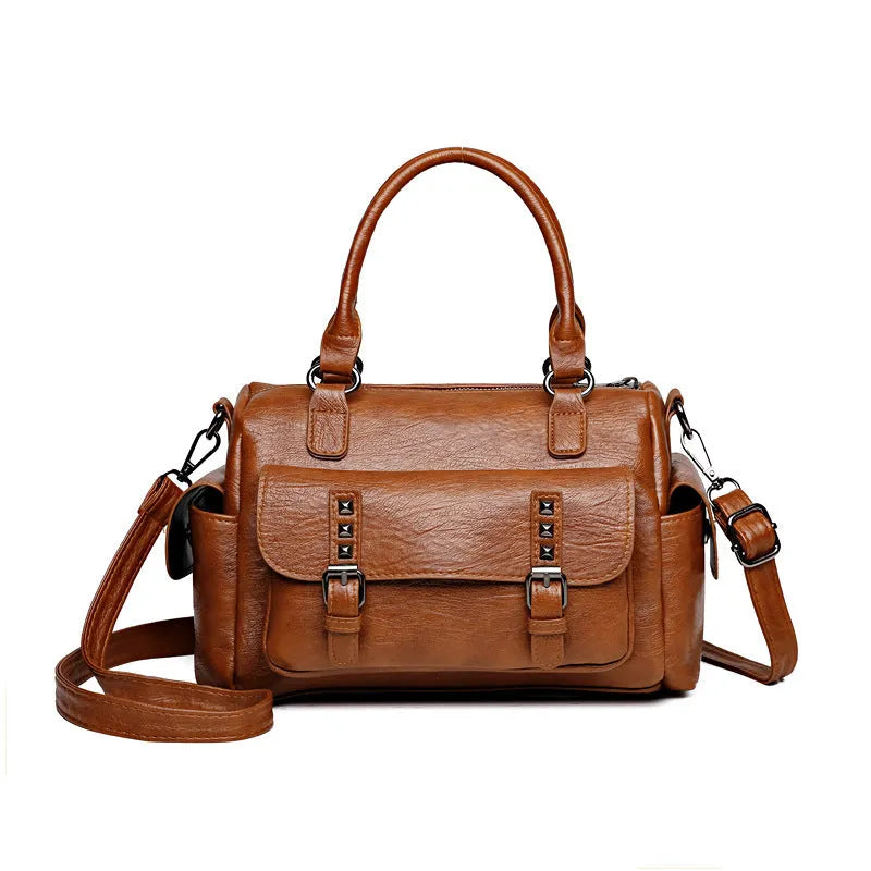 Vintage-style large capacity messenger bag in PU leather, showing contrast stitching and a horizontal square shape.