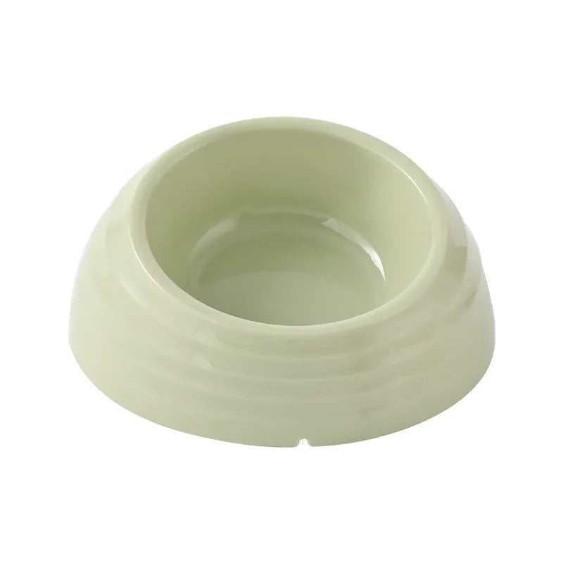 Stainless steel cat bowl with plastic non-slip base in a choice of beige, brown, or light green colours.