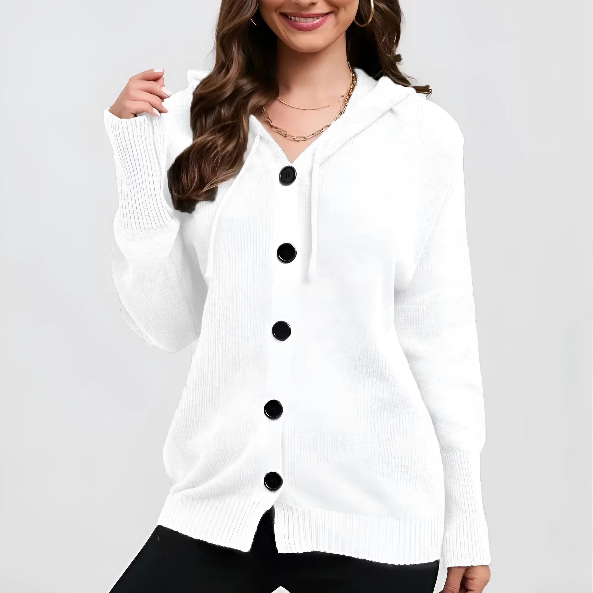 Women's solid colour hooded cardigan sweater in thick cotton fabric showing loose fit and regular sleeves