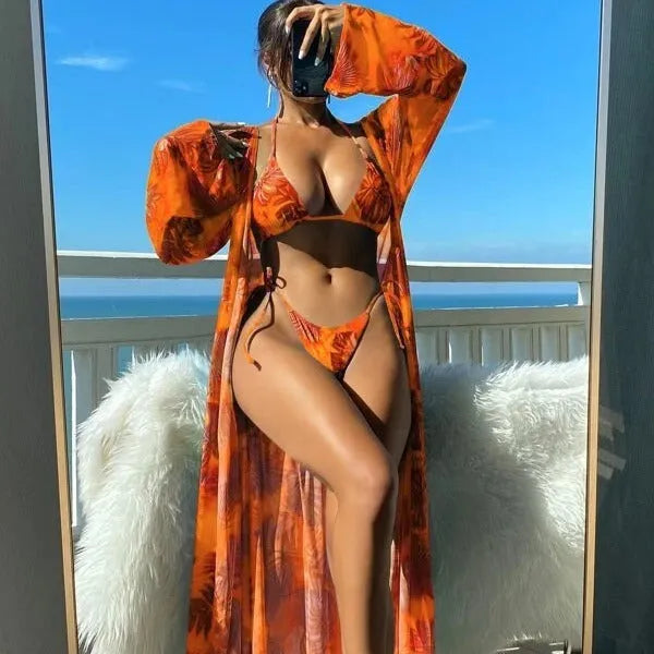 Women's long sleeve bikini set with floral banded briefs and cover-up robe