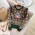 Green women's printed loose fit sweater with botanical pattern and V-neck design