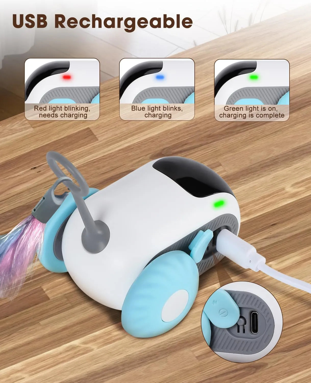 Blue and orange smart remote control cat toy car with feather teaser attachment on a home floor.