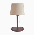 Walnut finish solid wood bedside lamp with fabric shade and cable switch