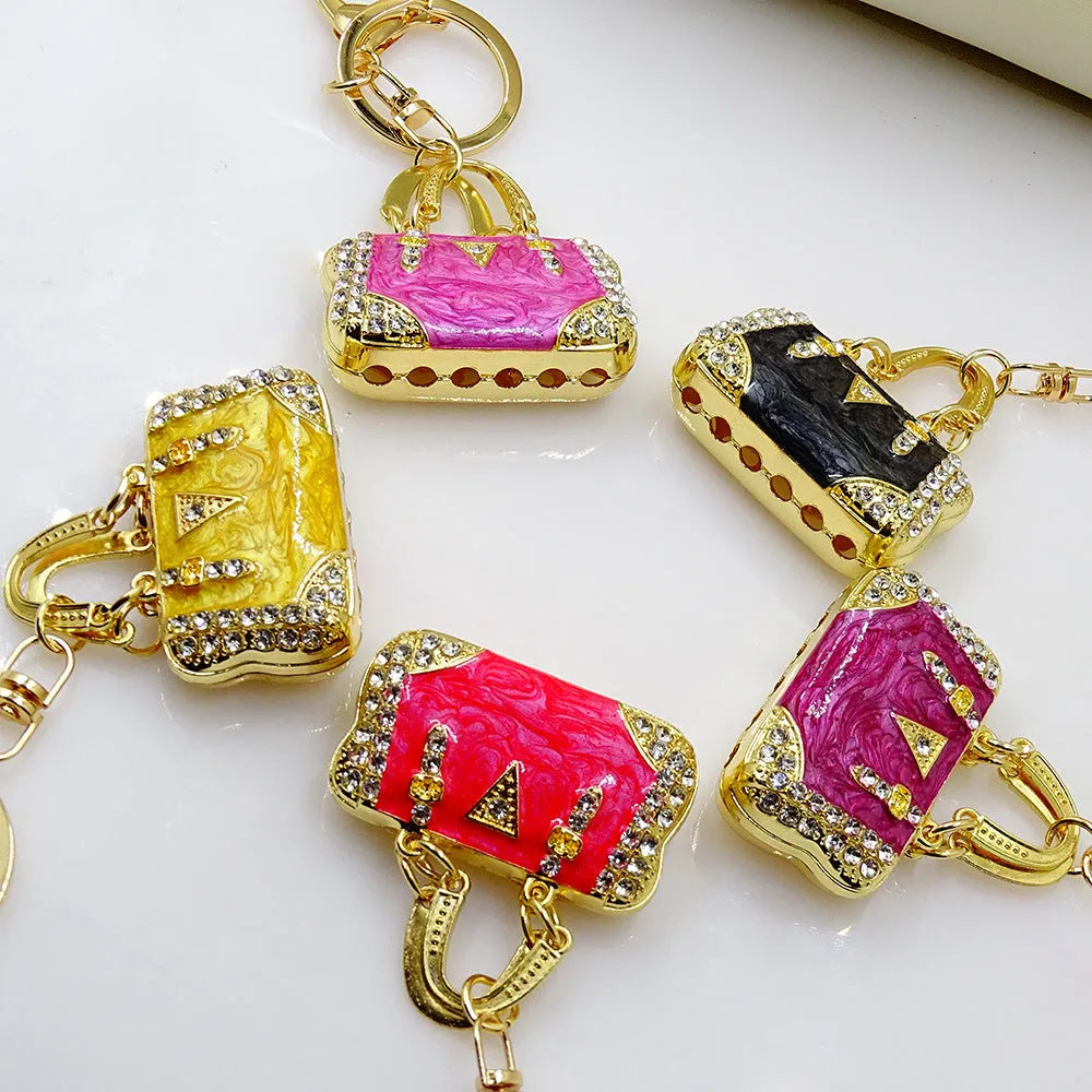 Alloy pendant keychain with enamel diamond cloud pattern in gold colour on keyring