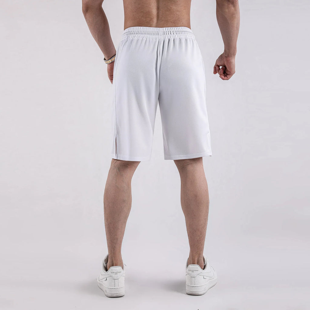 Man wearing loose black quick-drying capri pants for casual summer wear.