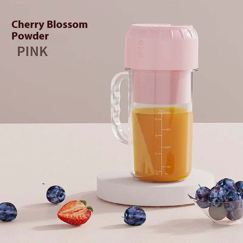 Portable USB juicer in avocado green or cherry blossom pink with multiple blade options for household use