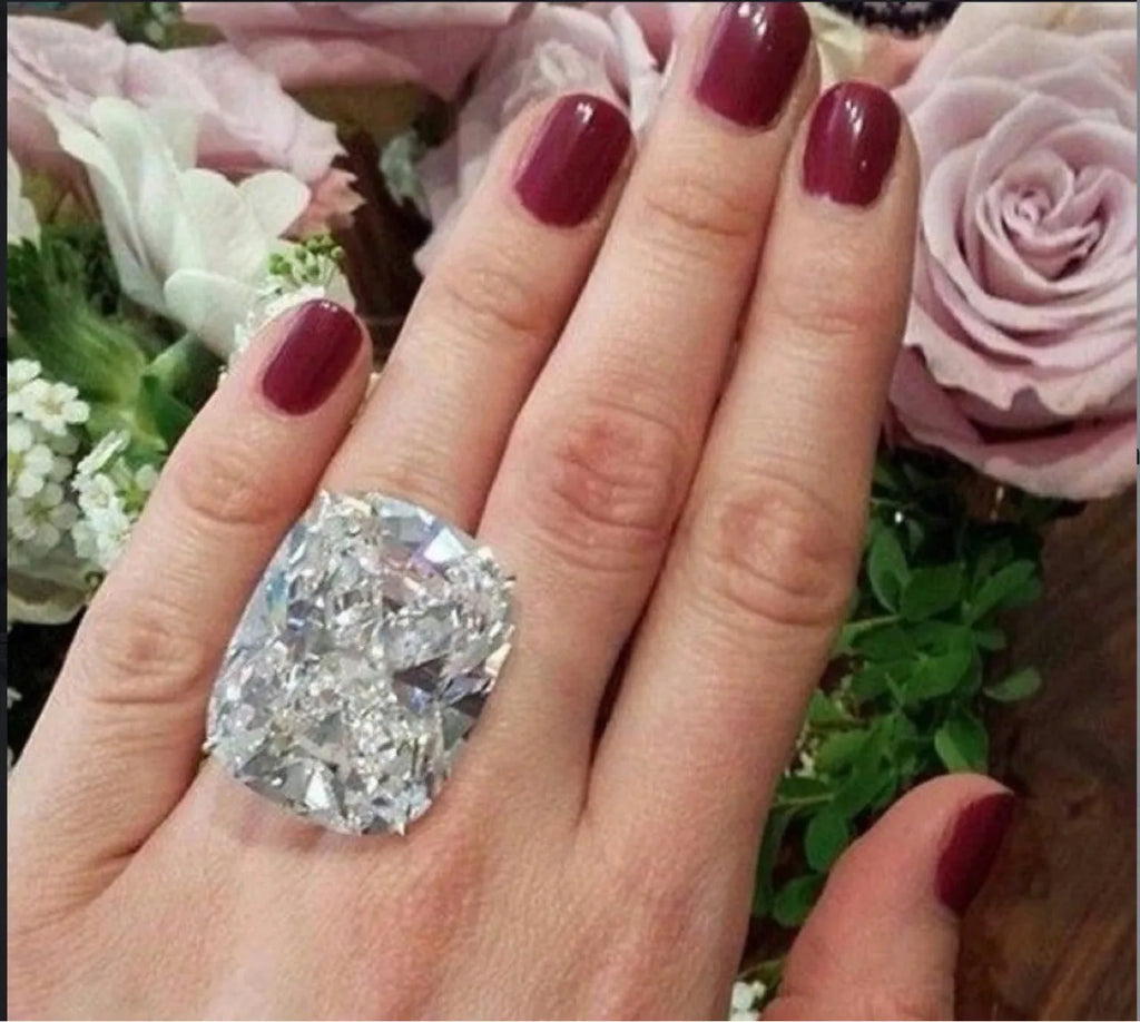 Simple geometric women's ring with white gold colour finish and inlaid square diamond design