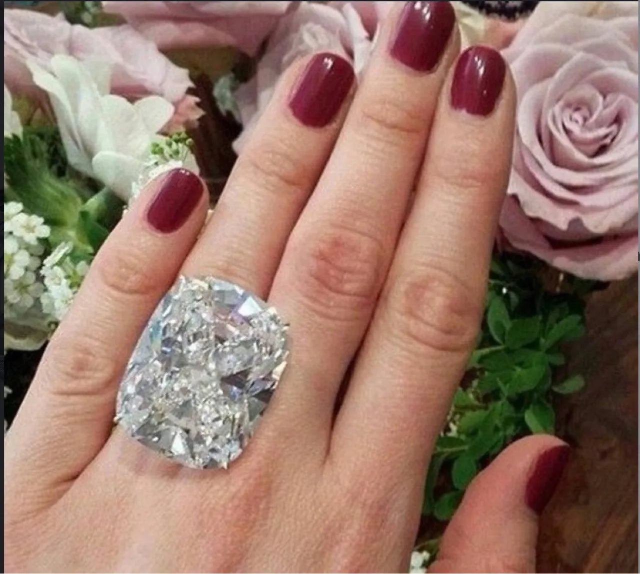 Simple geometric women's ring with white gold colour finish and inlaid square diamond design