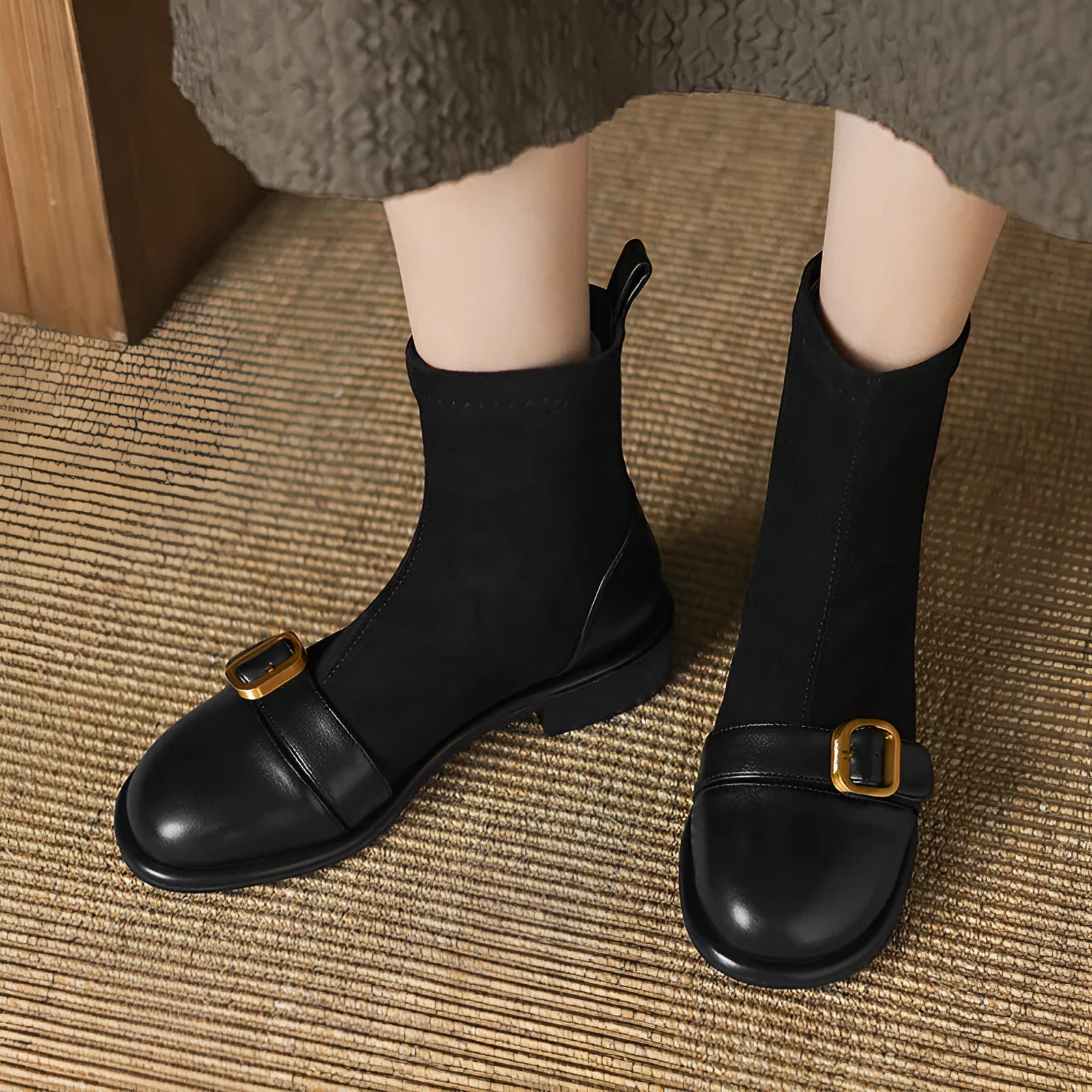 Women's black low heel Martin ankle boots with lace-up front and buckle stitching detail