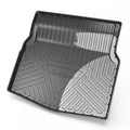 Black carbon fibre pattern TPE car trunk protector mat lying flat.