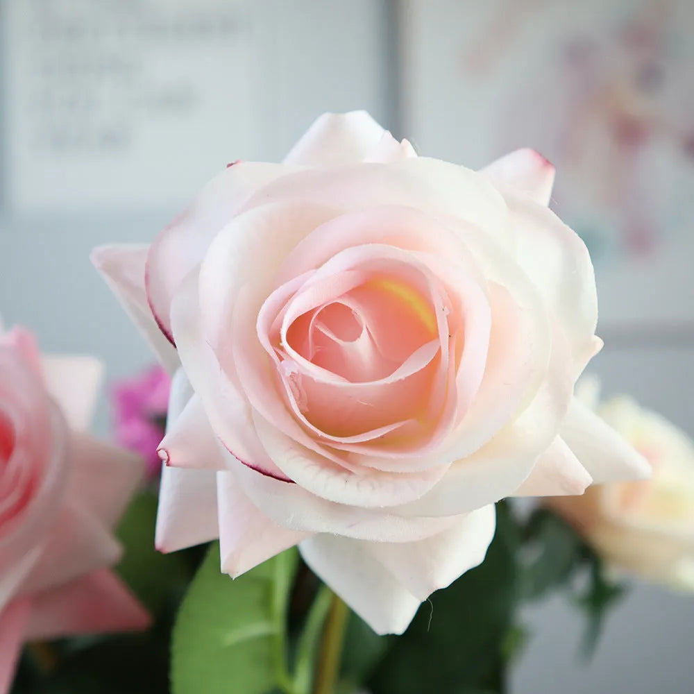 Artificial silk rose flower with red petals and green plastic stem measuring approximately 42cm long