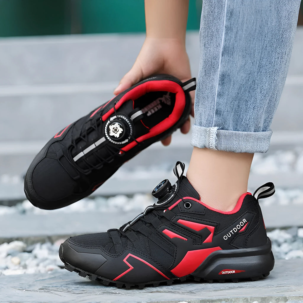 Men's beige off-road hiking shoes with elastic band closure and rubber sole.