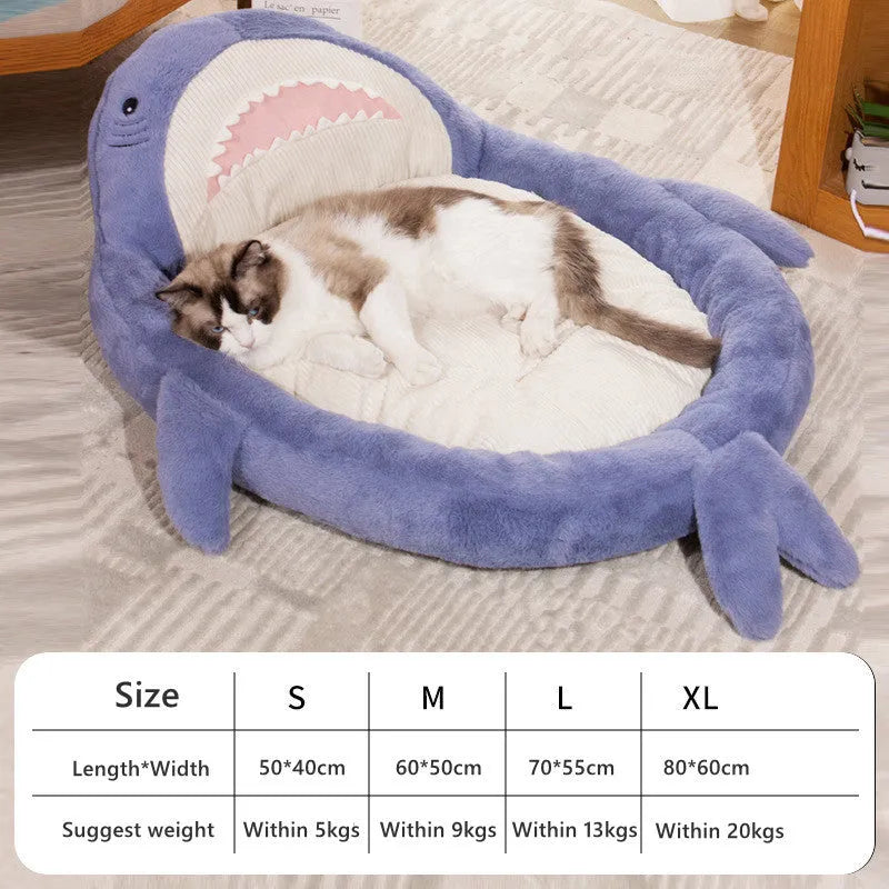 Blue shark pattern pet bed with anti-slip base showing velvet fabric texture