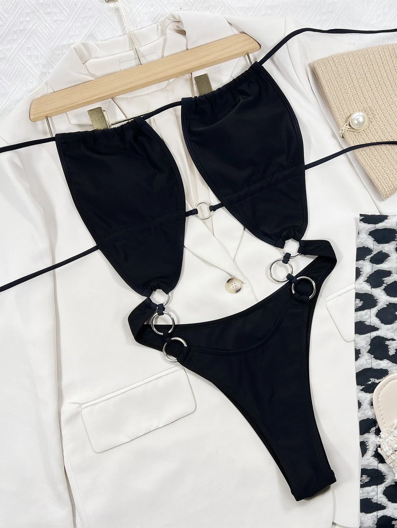 Black women's one-piece swimsuit with sleeveless design made from nylon fabric