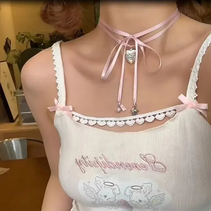 Women's ribbon love pendant fashion necklace on a clavicle chain, showing the alloy electroplated finish.