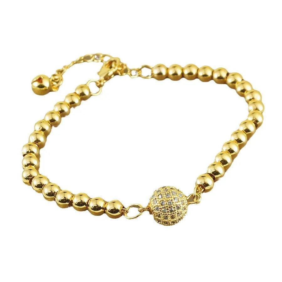 Women's copper bracelet with zircon Arabic styling and heart-shaped pendant on wrist