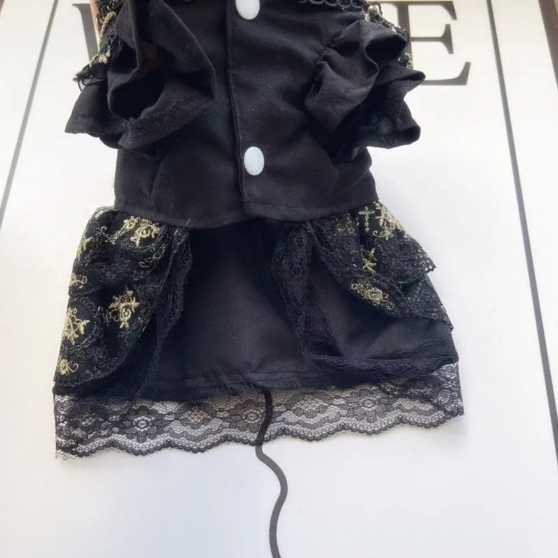 Golden gothic princess-style dress for a small dog or cat on a mannequin.