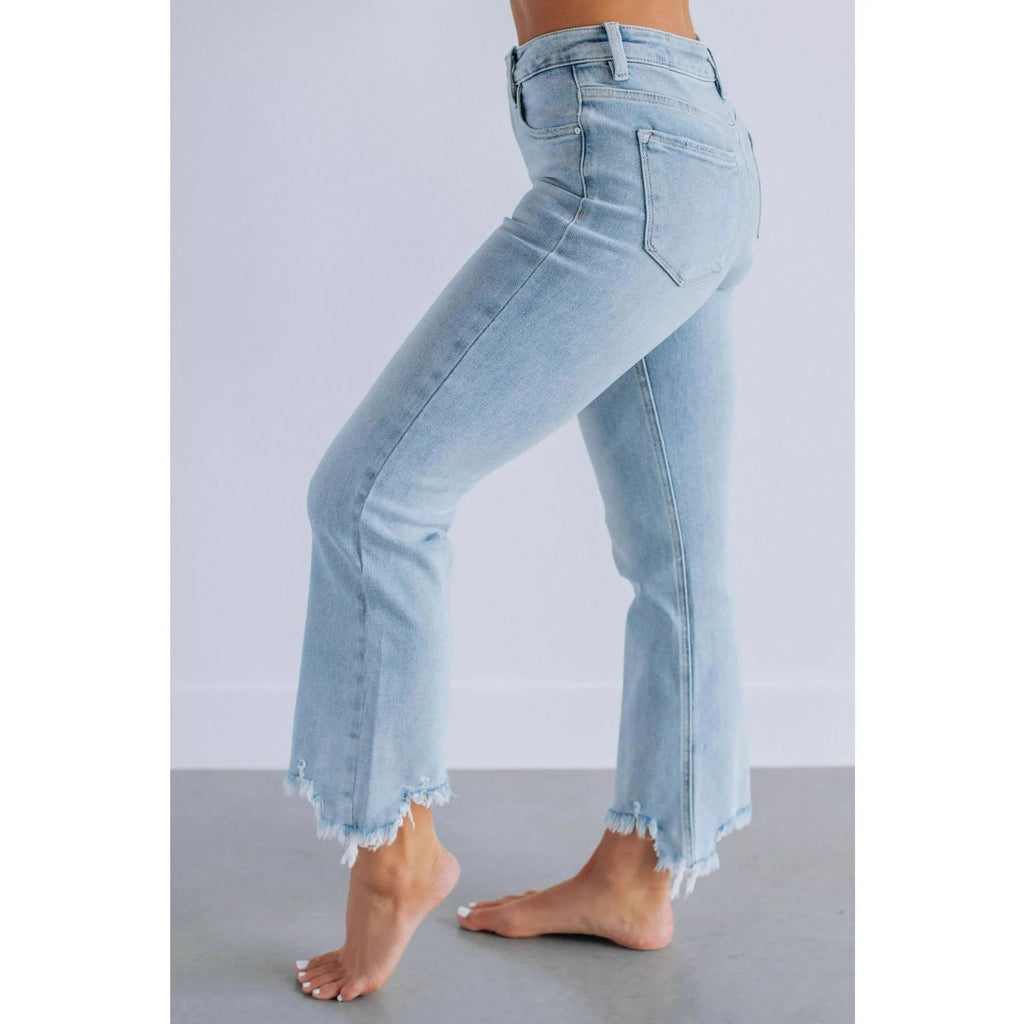 Women's straight leg denim jeans in dark blue and light blue, showcasing hand-worn craft details on cotton fabric.