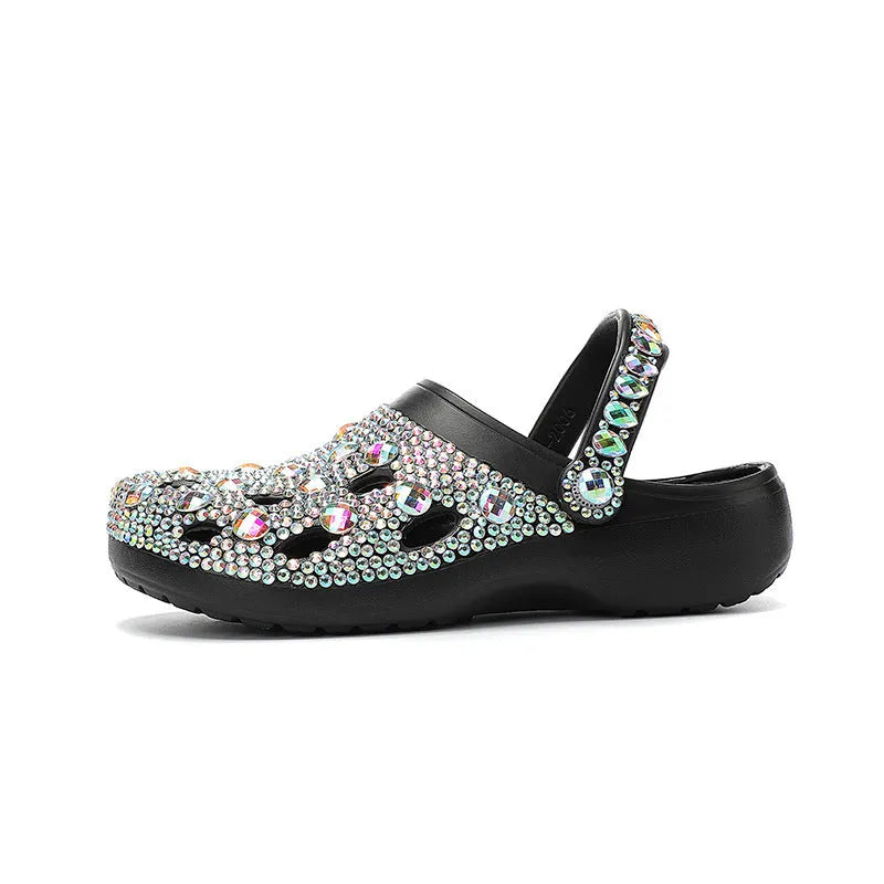 Black women's platform sandals with rhinestone decoration and hole shoe design on an EVA sole.
