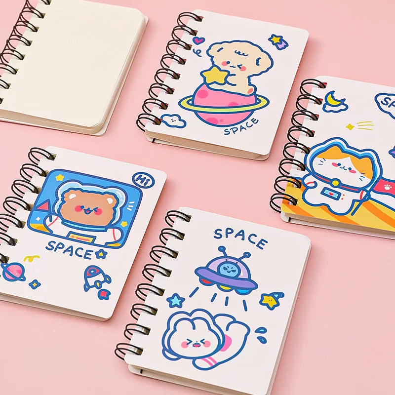 Astronaut pocket flipper notebook showing 10.5x8cm size with space-themed cover designs