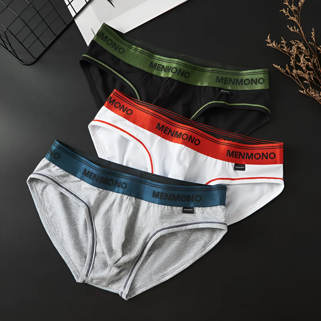 Men's low waist cotton briefs showing two-tone colour combinations including black/blue and white/red options