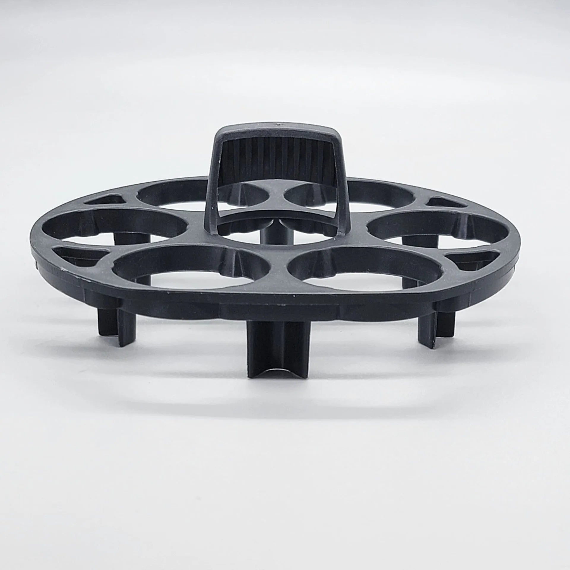 Black plastic egg holder keeper basket for kitchen storage, showing compact size.
