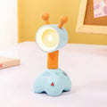 DIY magnetic cartoon small night lamp with multi-angle adjustable lighting on desktop