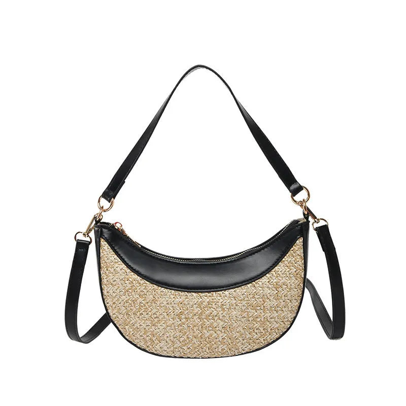 Women's hard straw dumpling-shaped crossbody bag in multiple colours with contrast stitching and internal organiser pockets.