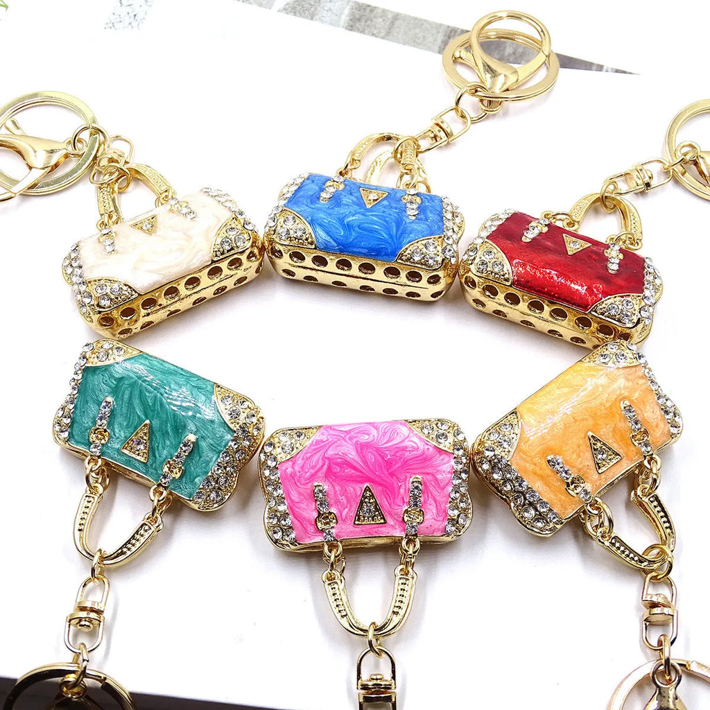 Alloy pendant keychain with enamel diamond cloud pattern in gold colour on keyring