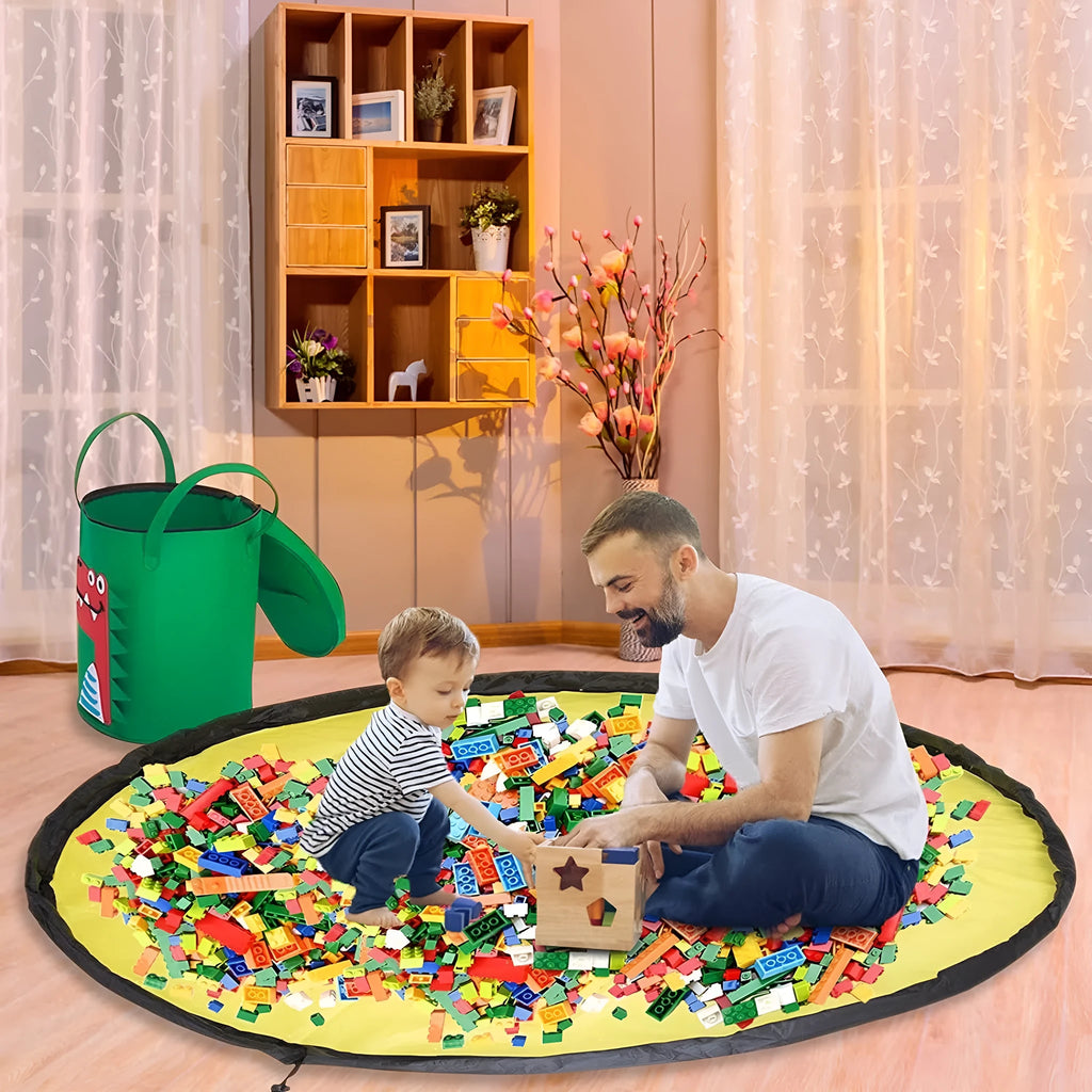 Green cube-shaped felt storage bag with a pull rope, shown as a toy organiser and play mat.