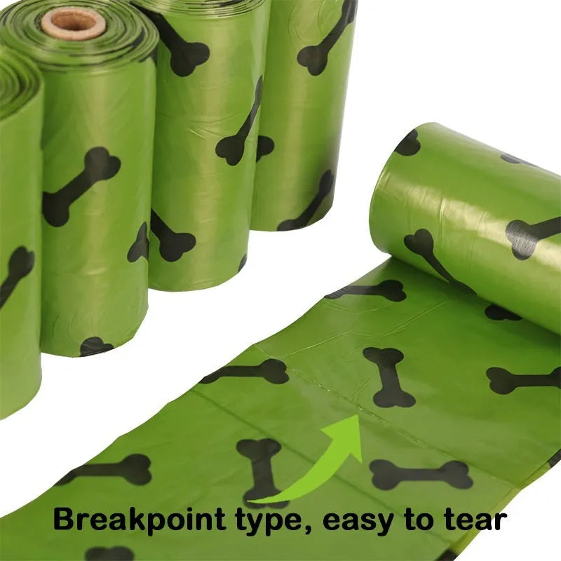 Degradable dog poop bags in military green with black bone print, showing roll format and bag dimensions