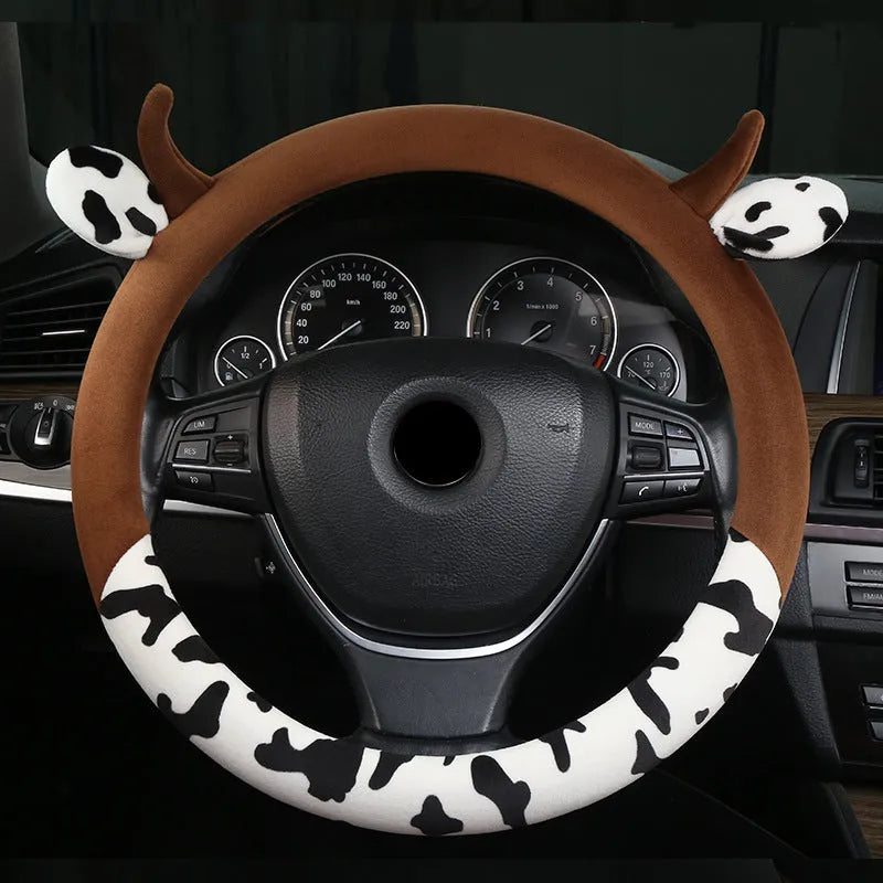 Black short plush steering wheel cover showing protective handle design on 38cm diameter