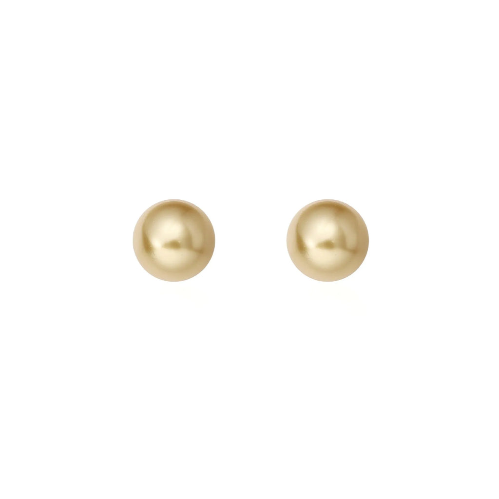 A pair of large pearl stud earrings with a geometric silver setting on a white background.