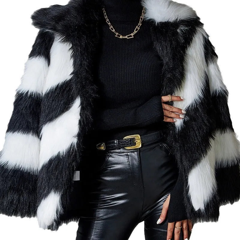Women's lapel contrast colour faux fur coat with a detachable fur collar on a hanger