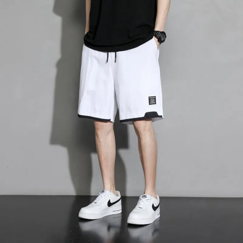 Boys plus size cotton shorts in black, khaki or white, showing mid-waist and shorts length design.