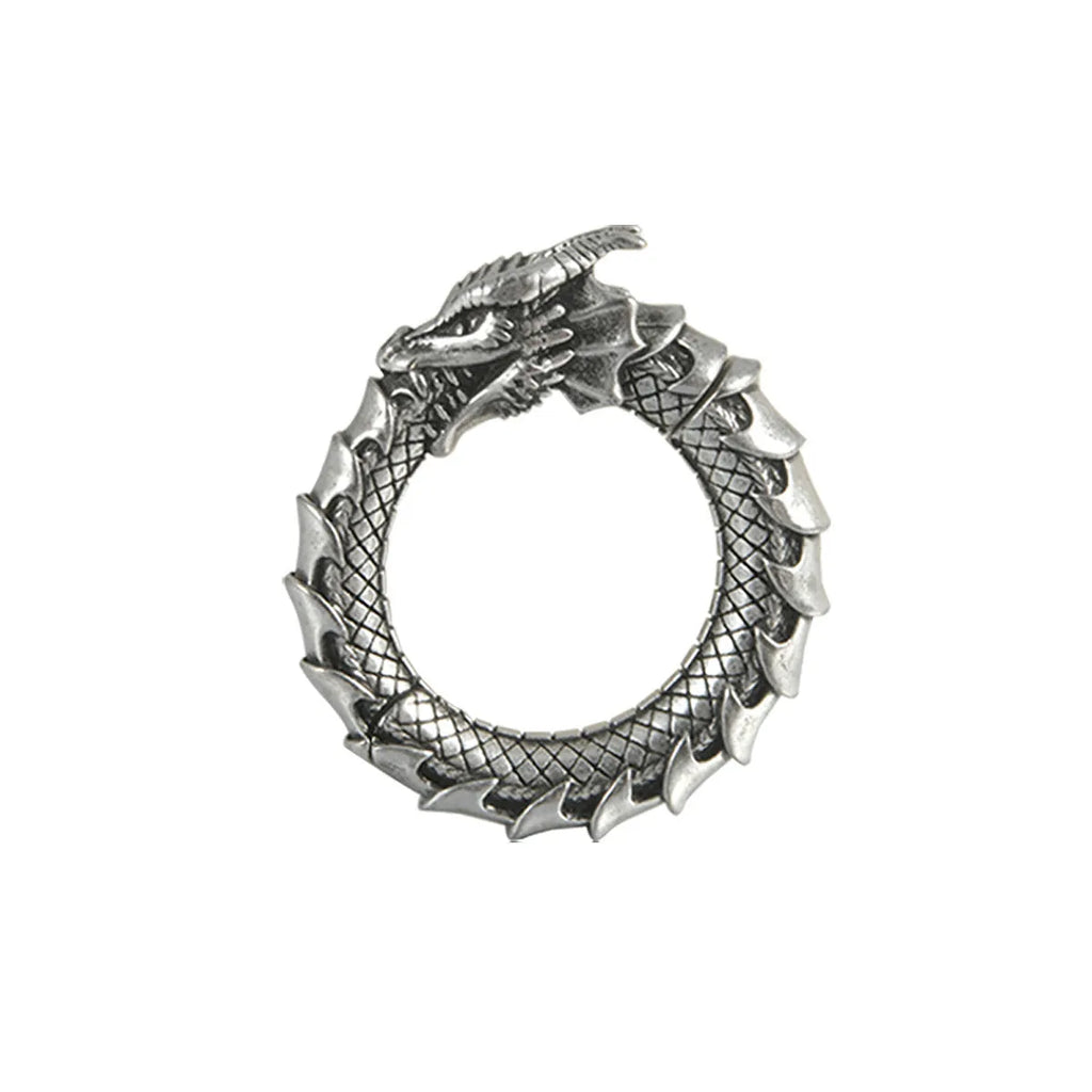 Geometric dragon shape stainless steel earrings in antique silver with hollow-out detail.
