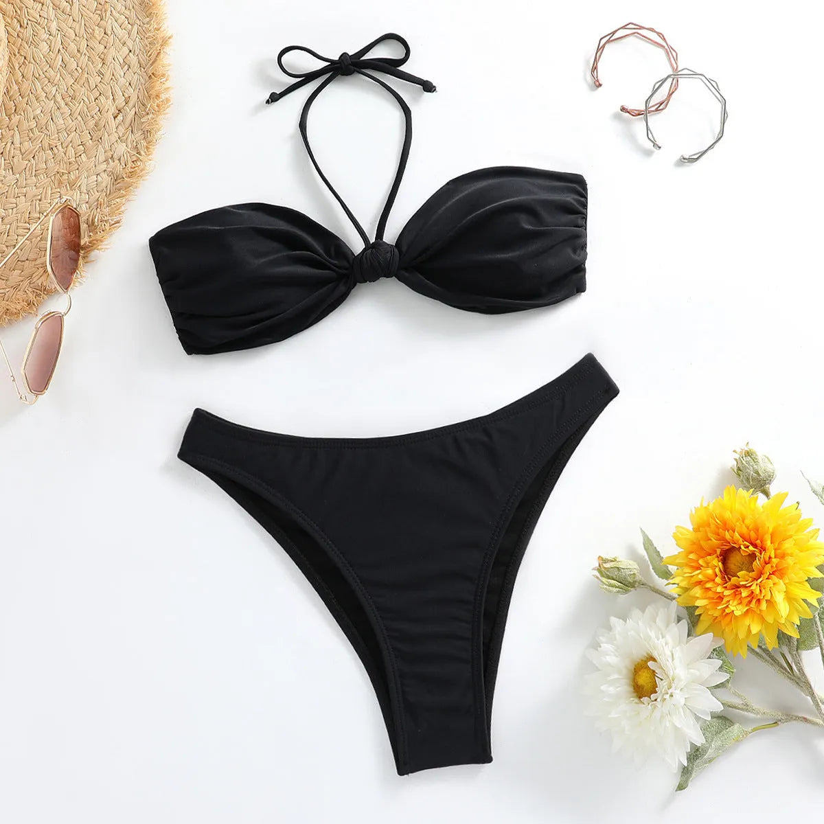 Black polyester women's bikini set with lace-up tube top and briefs.
