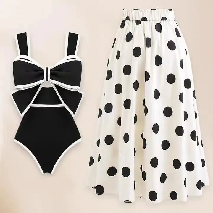 Women's black one-piece swimsuit with white round skirt and bow decoration for beach swimming