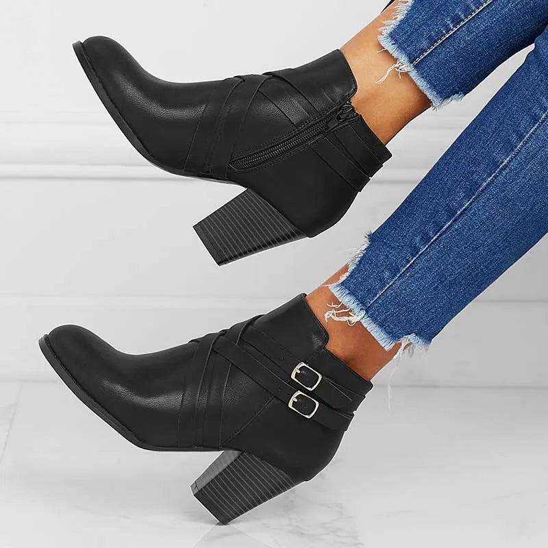 Women's plus size black short ankle boots with 7cm chunky heel and side zipper.