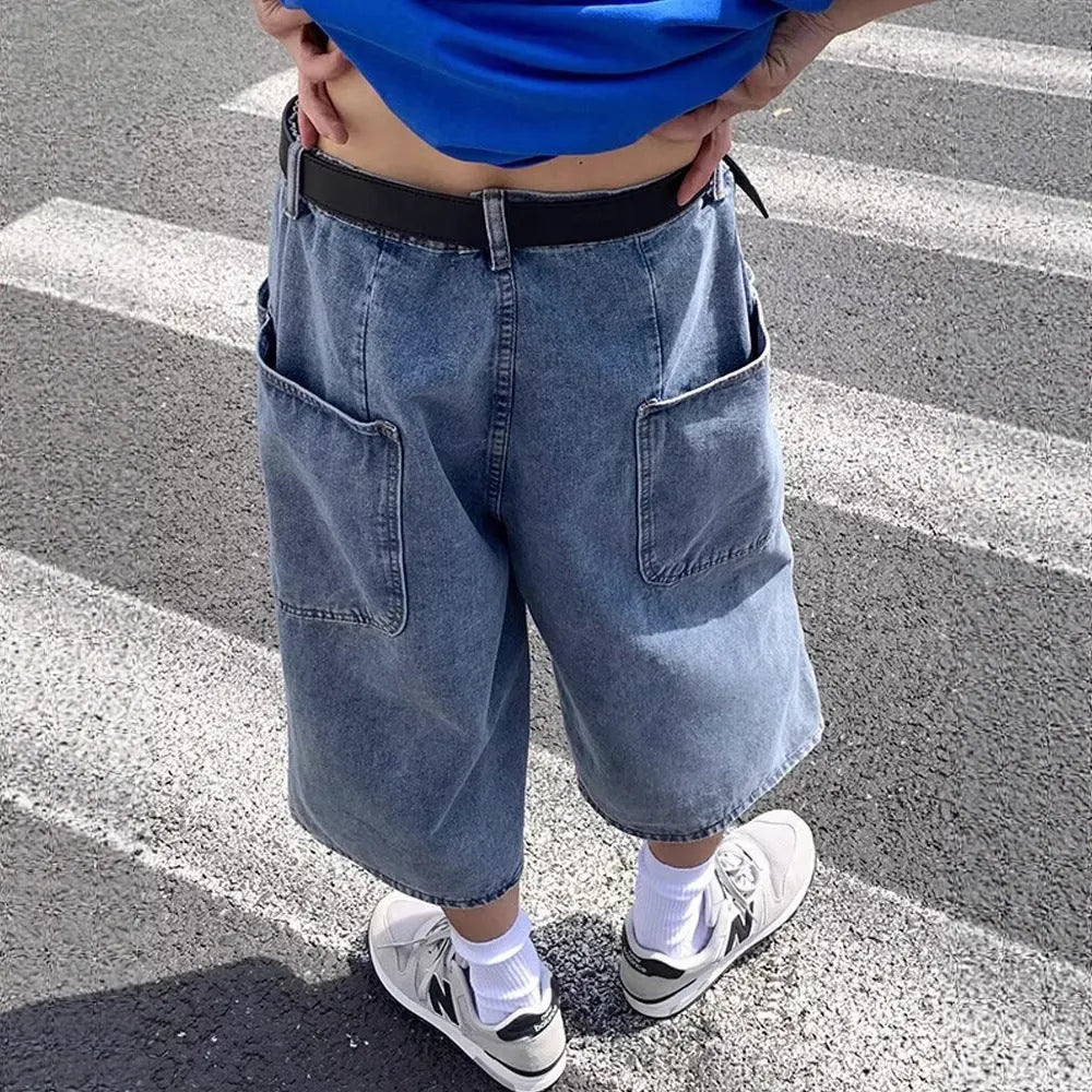 Men's washed blue denim pirate shorts with high-waist and cropped length design