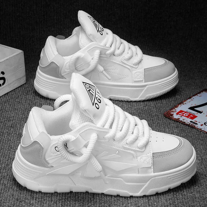 Men's white chunky sneakers with thick rubber sole and cartoon pattern details