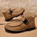 Black casual PU leather slip-on loafers with visible handmade stitching on a flat, low-heel sole.