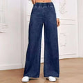 Light blue washed wide-leg denim trousers on hanger showing straight fit and mid-rise waist