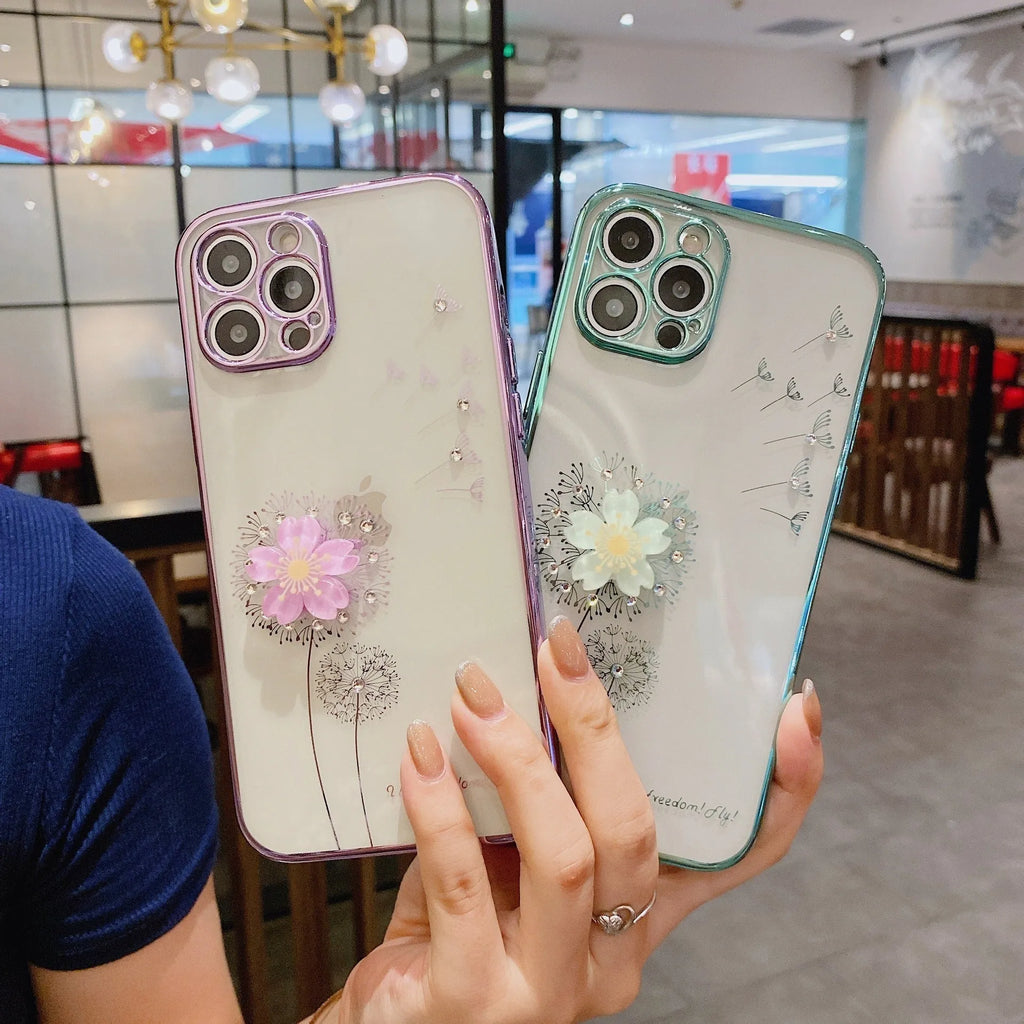Green TPU iPhone case with a spinning 3D pink flower stand on the back