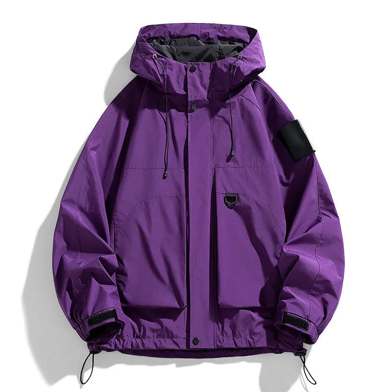 Men's black hooded windproof waterproof jacket shown on a model, with size chart showing options from M to 8XL.