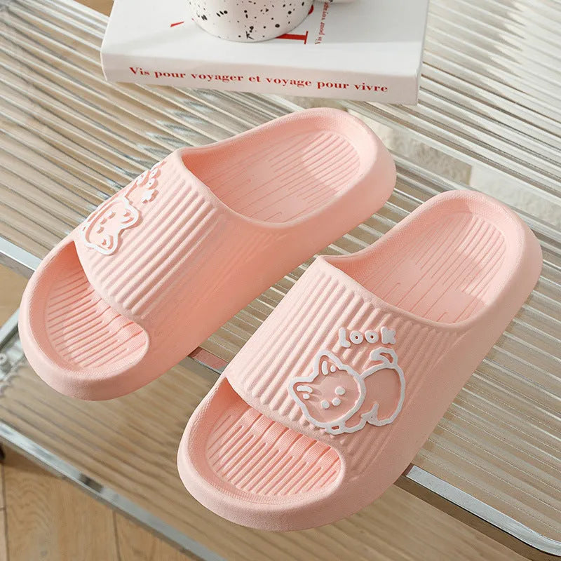Green EVA foam cat slippers with thick platform sole and anti-slip pattern.