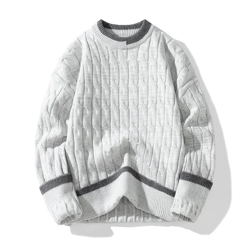 Man wearing a two-piece loose fit sweater in a sports style, showing the acrylic and modal fabric texture.