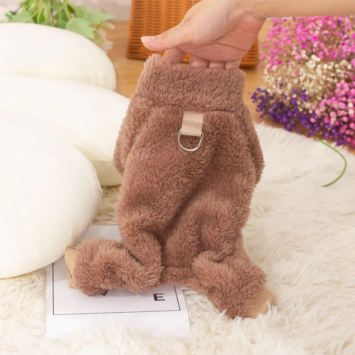 A khaki double-sided plush four-legged dog coat with a high collar and a metal towing ring on the back.