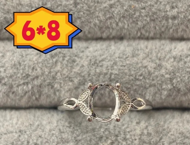 Oval denier ring with open mouth design and five-pointed star decoration on copper band