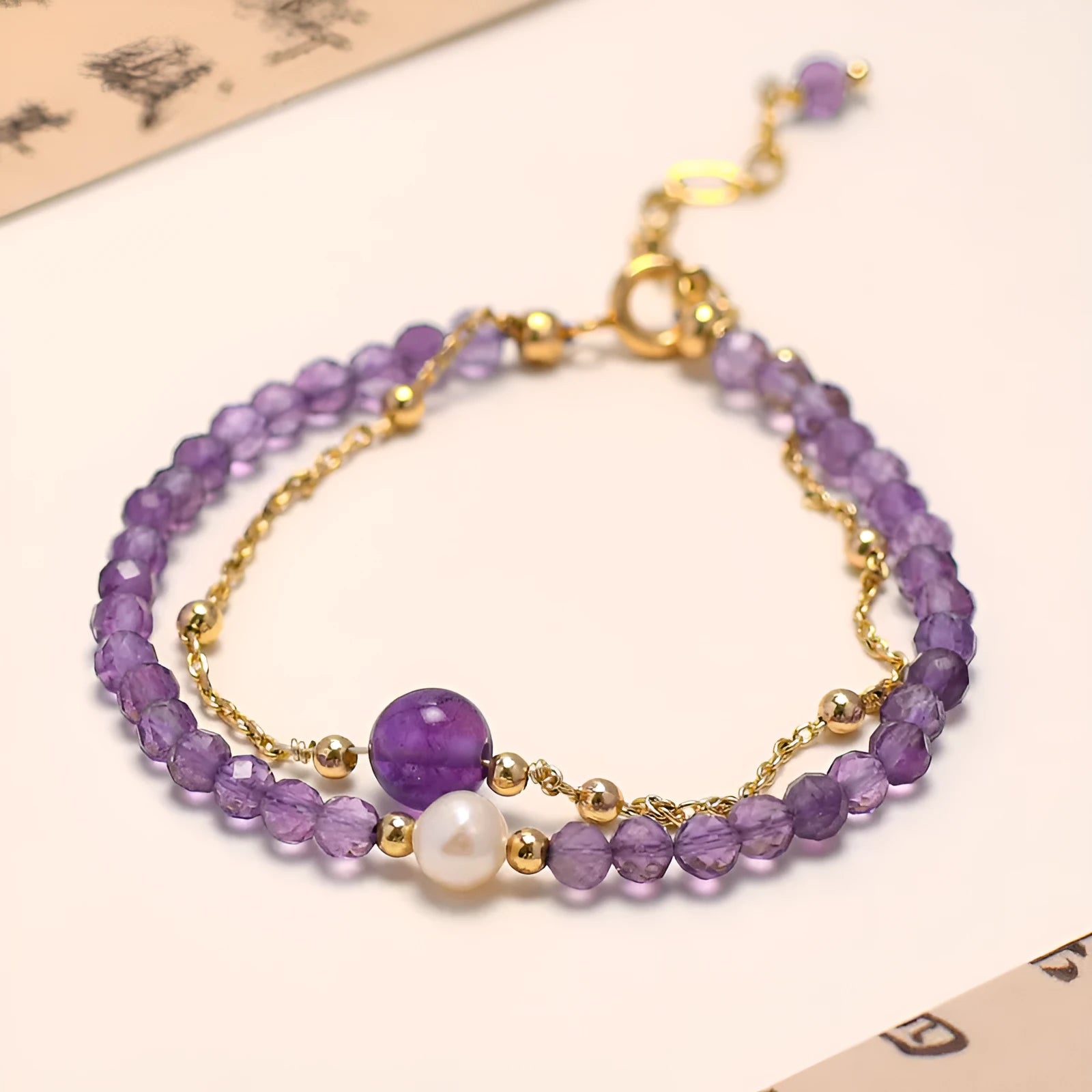 Chinese style amethyst crystal bracelet with diamond shapes and electroplated finish for women.